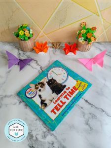 Learning to Tell Time with Puppies and Kittens