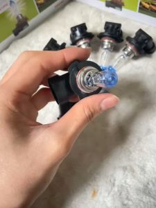 Bóng đèn pha ô tô bóng đèn Halogen 9005/HB3 đầu xanh siêu sáng. Điện 12v và 24v