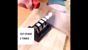 Portable Knife Sharpener for Home Kitchen or Outdoor Camping with Red and Black Handle and Multiple Slots
