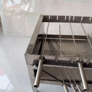 Máy nướng thịt than hoa quay tự động . Mẫu máy 7 xiên INOX - Tặng Kèm 6 Xiên Đơn và 1 Xiên 3 INOX . Mô tơ 14W