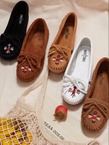 Minnetonka | Easy-on Flat Moccasins with Thunderbird Beads