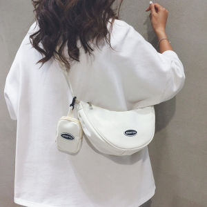 กระเป๋าผ้าใบสไตล์ญี่ปุ่นสำหรับผู้หญิง กระเป๋าสะพายข้างทรงขนมจีบแบบลำลอง กระเป๋าสะพายข้างแบบสะพายข้างอเนกประสงค์ กระเป๋าสะพายข้างสำหรับเดินทาง