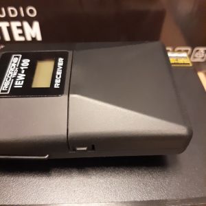 Recording Tech IEW-100 Body Pack Transmitter microphone in ear