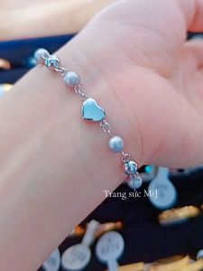 LẮC TAY TITAN NỮ TRÁI TIM - Trắng/Vàng - KHÔNG ĐEN KHÔNG GỈ [Trang sức MiJ]