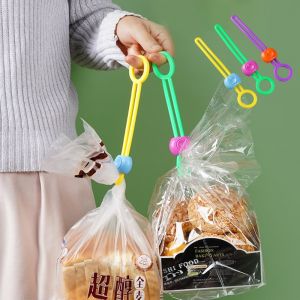 4Pcs สายรัดเก็บขนมปังอาหาร คลิปปิดสายรัดประทับตราสีแบบปิดผนึกใช้งานได้หลากหลาย