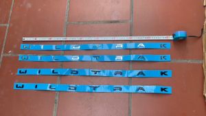 Chữ WILDTRAK dán nắp CABO Ford Ranger đời 2023+ (KT: 2 x 89 cm)