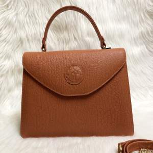 Túi da voi thật dáng hình thang nắp gập màu cam