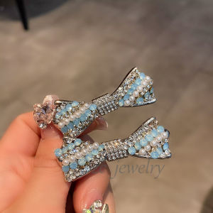 Korean Style East Gate New Model Pearl Bow Tie Edge Clip Womens High End Sweet Hair Clip Fashionable Hair Accessories