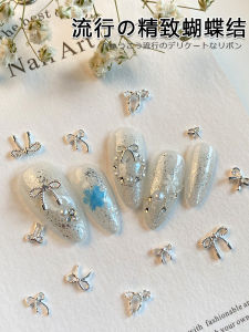 Trendy Mini 3D Cute Christmas Lace Silver Metal Butterfly Knot Nail Art Decorations Embellishments China Made Normal Size