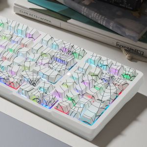 The side-cut transparent spider web lines with a total of 130 five-sided heat-sprayed keycaps that are universal keycaps.