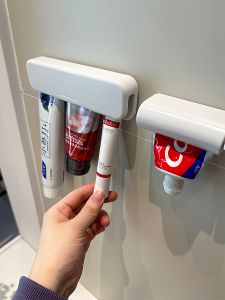 Bathroom Wall-Mounted Toothpaste Shelf No-Drill Face Wash Storage Clamp Home Personal Cleaning Tool Organizer Holder Rack