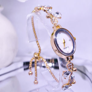 นาฬิกาข้อมือควอตซ์สำหรับผู้หญิงกำไลนาฬิกาข้อมือผู้หญิงวงรีทรงเพชรริบบิ้นบางๆรูปดอกไม้ใหม่ปรับได้อย่างอิสระของขวัญ
