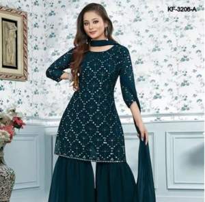 Maroon traditional outfit with intricate white patterns and flared pants. Suitable for formal occasions.