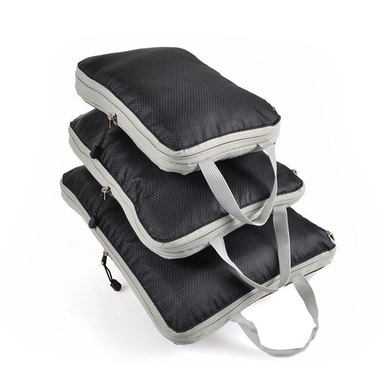 Set di 3 organizer da viaggio comprimibili, capienti e adatti a ogni occasione, nei colori nero, blu e grigio.
_voghion.com