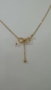 Poh Heng Jewellery 22K Freestyle Love Knot Necklace in Yellow Gold[Price By Weight]