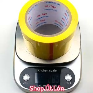 1 Cuộn băng keo màu vàng OPP rộng 7cm dài 75 mét lõi giấy 3mm giá tại xưởng