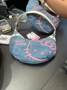 HelloKitty Canvas Denim Handbag High Aesthetic Value Single Shoulder Commuter Large Capacity Versatile Soft Handle Zipper Closure
