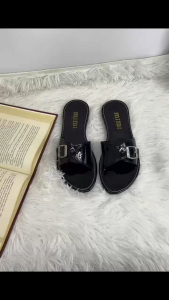 RD639 Womens slide sandals Key attributes: Buckle strap Open toe Slip-on Flat sole Glossy Casual summer wear Scene: Beach or poolside