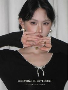 Early Autumn New French Style Pure Desire Pearl Butterfly Knot Long Sleeve Knitted Sweater Slimming Top Womens Cashmere Shirt