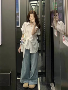 VKSOD | เสื้อเชิ้ตแขนสั้นสีขาวสไตล์ฝรั่งเศสสำหรับผู้หญิงในช่วงฤดูร้อนปี 2025 เสื้อเชิ้ตทรงเข้ารูปไม่สมมาตร ทรงหลวม สไตล์เกาหลี