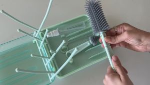 6 in 1 Baby Travel Bottle Cleaner Set with Drying Rack, Silicone Baby Bottle Brush, Straw Brush, Nipple Brush, Soap Dispenser and Storage Box: Portable Baby Essentials for Home & Travel (Pink)