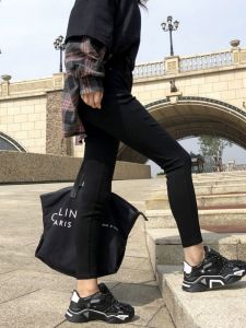 กางเกงขายาวทรงเข้ารูปผ้าขนแกะสีดำ ทรงสลิมฟิต กางเกงขายาวทรงแมジิกสำหรับผู้หญิง ทรงเข้ารูป กางเกงขายาวทรงแมจิกสำหรับฤดูใบไม้ร่วงและฤดูหนาว