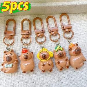 5ชิ้นตัวการ์ตูนน่ารัก Capybara เรซิ่นเสน่ห์กระเป๋านักเรียนพวงกุญแจห้อยกระเป๋าของขวัญเครื่องประดับพวงกุญแจรถ