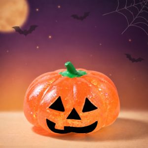 Schylling | The Halloween themed squid squeeze toy has a gentle touch and is suitable for childrens gifts and holiday decoration toys.