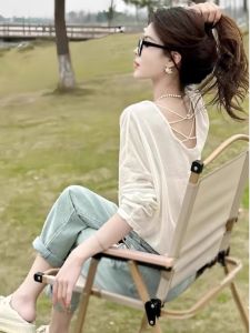 เสื้อยืดแขนยาวเปิดหลังสำหรับผู้หญิงในช่วงฤดูร้อนปี 2025 ทรงหลวม น้ำหนักเบา ระบายอากาศได้ดี เสื้อคลุมเครื่องปรับอากาศแบบลำลอง