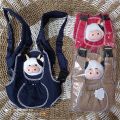 GENDONGAN DEPAN BONEKA KEPALA SAPI. 