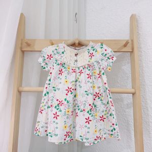 Váy hoa phối ren bé gái