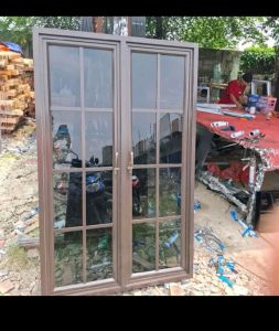 kusen jendela kesment 2 daun tambah urnamen ukuran 100x100 tinggi 100 Lebar 100