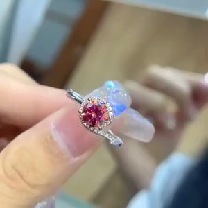 A stylish and high-quality 925 sterling silver 1-carat red six-prong round moissanite ring.