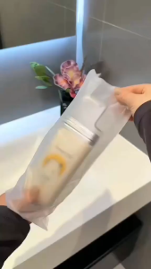 HOME + HOUND Travel mouthwash cup with 3-in-1 functionality for business trips. Features include a transparent Suitable for home and travel use.