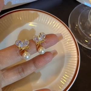 good 999 Fashionable bow zircon tassel pearl elegant earrings ES64830