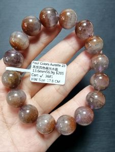 Auralite 23 Beaded Bracelet with Four Colors Crystal - Brown Purple Red Clear - Worn on Wrist - Displayed with Raw Crystal
