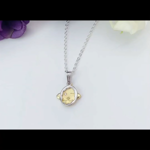 SilverWholesale #PH358 Two Tone Platinum & Gold Plated 925 Silver Chick Egg Pendant – 2 Layer Movable Design with Cubic Zirconia