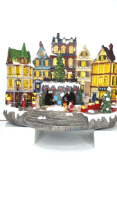 ONELINE #FC615  Home Accents Holiday Animated Holiday Downtown collectible featuring illuminated buildings and a rotating tree with lights & music