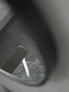 Stainless Steel Heavy Rotating Single Hole Hot and Cold Basin Faucet