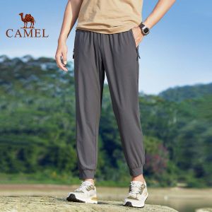 Quần thể thao thoáng khí nhanh khô nam Lạc Đà Lụa băng quần túi có khóa kéo