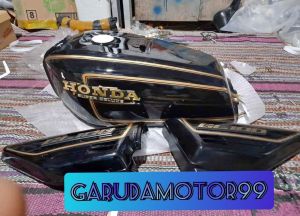 SANDANGAN GL 100 GL CEPEK GL 125 TANGKI PRES PABRIKAN IMPOR SET TEMPONGAN AKI SEPASANG SUDAH ADA STRIPNYA TINGGAL PASANG.HARGA EKONOMIS(bonus emblem tangki)