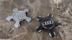 01 chiếc Logo chụp mâm lazang bánh xe Au.di đường kính 135mm A6Q5135-D ( Màu Đen )