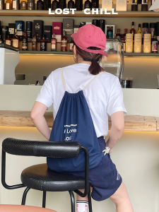 กระเป๋าเป้สะพายหลังผ้าใบความจุขนาดใหญ่สไตล์เกาหลี กระเป๋าเดินทางแบบย้อนยุคสำหรับกลางแจ้ง กระเป๋าใส่ของใช้สำหรับเยาวชน กระเป๋าเป้สะพายหลังแบบมีสายรัดด้านหน้า