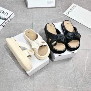 Dép quai chéo nơ 2 đế dày 4cm chữ NNiu hàng loại 1 mẫu mới