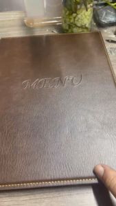 Bìa menu A4 ép chìm màu nâu đen cho nhà hàng khách sạn.