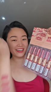 CHEMIST SHEA Double Touch Matte + Glaze (2 x 3.5g) by Mixtrue Beauty Two-in-one lip product with matte and glaze finishes. Displayed on a makeup case with lip swatches. FDA approved.