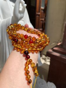 Chuỗi hổ phách hoa tự nhiên 108 viên hàng 86li. Chuỗi hạt lớn niệm Phật.