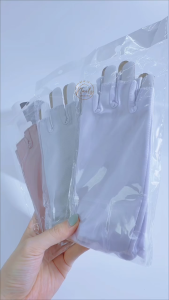 Cặp găng tay chống tia UV làm móng nails