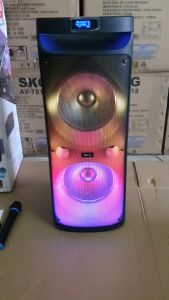 SKG ลำโพง ลำโพงพกพา บลูทูธ ล้อลาก 10นิ้วx2ดอก 40wRMS ขยาย 21000 W ไมค์ลอย 1ตัว เสียงดี เบสแน่น ไฟวิบวับ (ปิด-เปิดได้) รุ่น KG-052 สีดำ