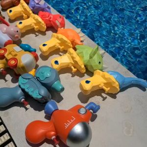 Súng nước đồ chơi cho bé - Súng nước khủng long